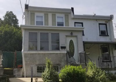 A house with a lot of windows and doors